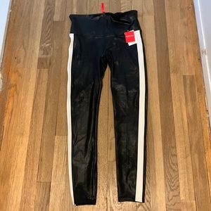 Size large faux leather Spanx with racing stripes
